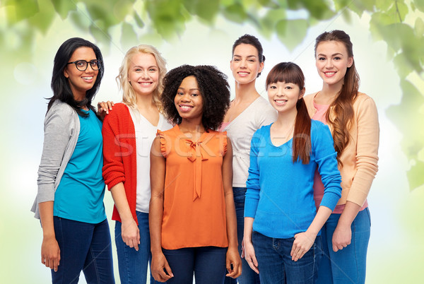 international group of happy smiling women Stock photo © dolgachov