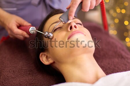 woman having microdermabrasion facial treatment Stock photo © dolgachov