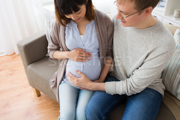close up of man and pregnant woman Stock photo © dolgachov