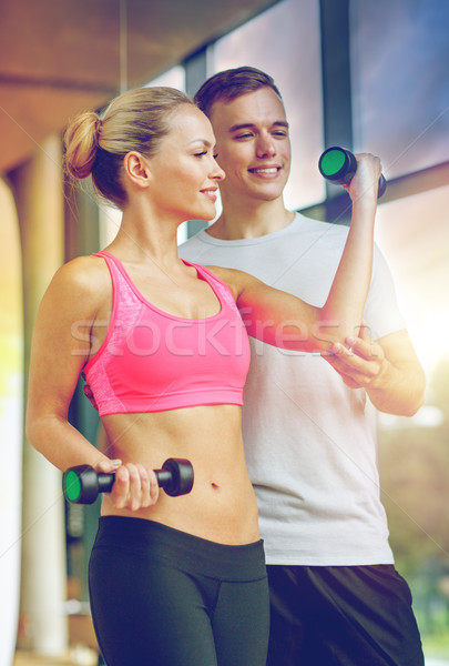 Foto stock: Sonriendo · entrenador · personal · gimnasio · fitness · deporte
