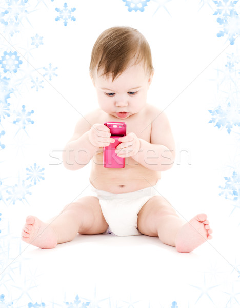 Baby mobiele telefoon foto jongen luier roze Stockfoto © dolgachov