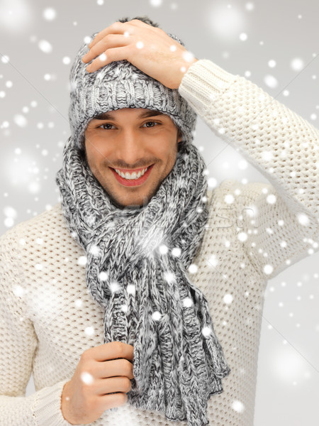 Jóképű férfi meleg pulóver kalap sál kép Stock fotó © dolgachov