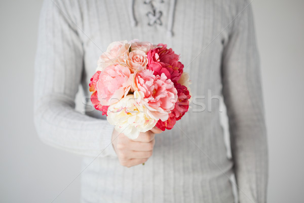 Stock foto: Mann · halten · Bouquet · Blumen · junger · Mann