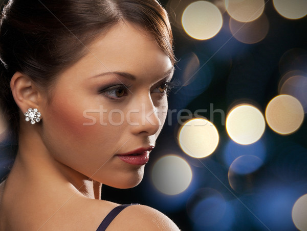 Kobieta suknia wieczorowa diament kolczyki luksusowe Zdjęcia stock © dolgachov