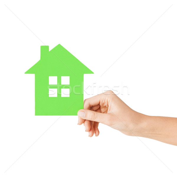 hand holding green paper house Stock photo © dolgachov