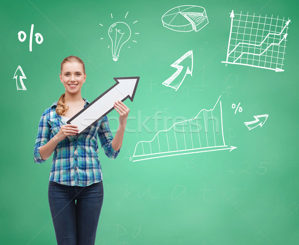 smiling student girl with white arrow pointing up Stock photo © dolgachov