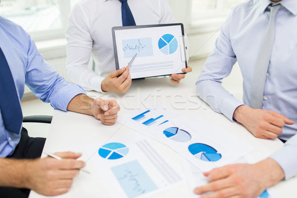 Stock photo: close up of businessman hands with clipboard