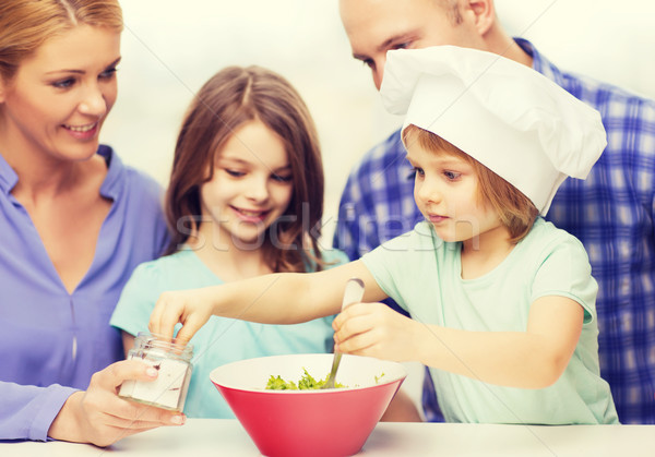 happy family with two kids eating at home Stock photo © dolgachov