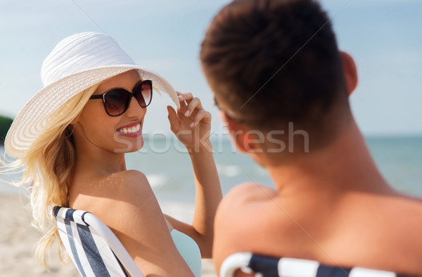 счастливым пару солнечные ванны лет пляж любви Сток-фото © dolgachov