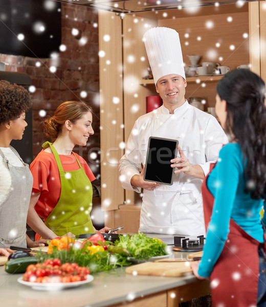 happy women with chef and tablet pc in kitchen Stock photo © dolgachov