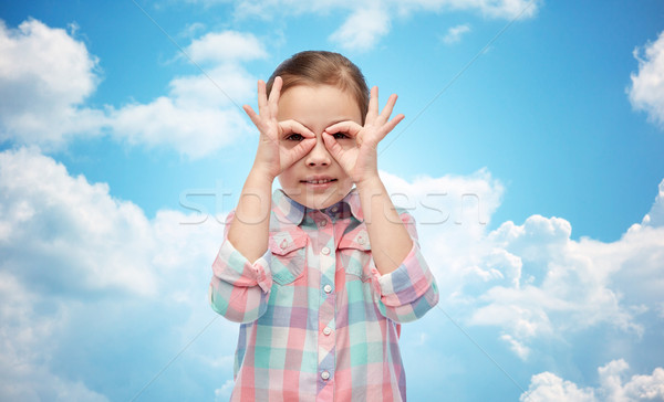happy little girl making faces and having fun Stock photo © dolgachov