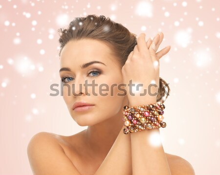 Mujer hermosa cara pendiente glamour belleza Foto stock © dolgachov