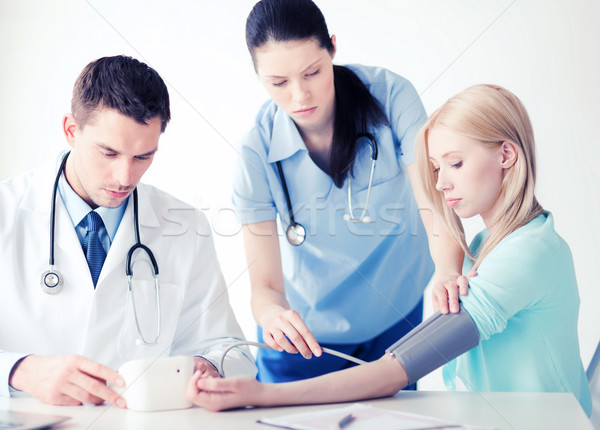 doctor and patient in hospital Stock photo © dolgachov