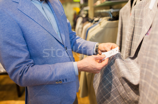 Homem escolher roupa roupa armazenar Foto stock © dolgachov