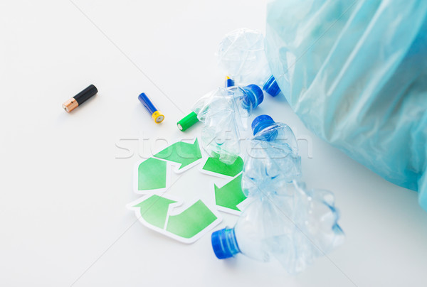 close up of used bottles and batteries recycling Stock photo © dolgachov