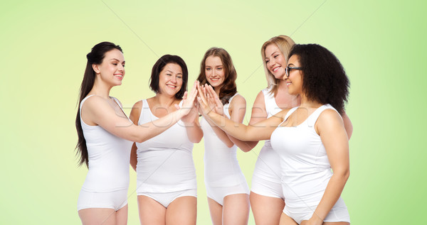 Gruppe glücklich unterschiedlich Frauen High Five Stock foto © dolgachov