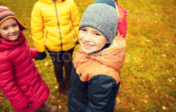 Enfants mains tenant jouer automne parc enfance [[stock_photo]] © dolgachov