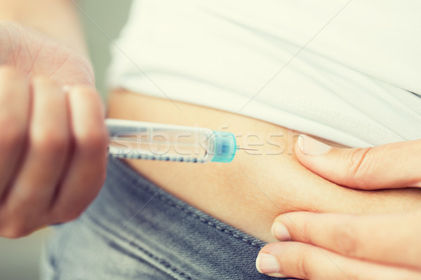 Handen injectie insuline pen Stockfoto © dolgachov