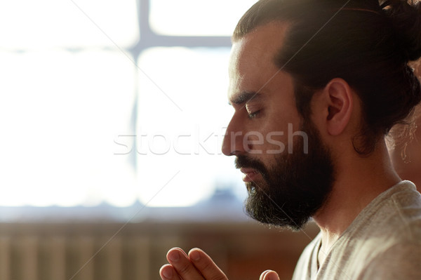 Közelkép férfi meditál jóga stúdió vallás Stock fotó © dolgachov
