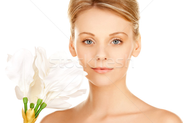 beautiful woman with madonna lily Stock photo © dolgachov