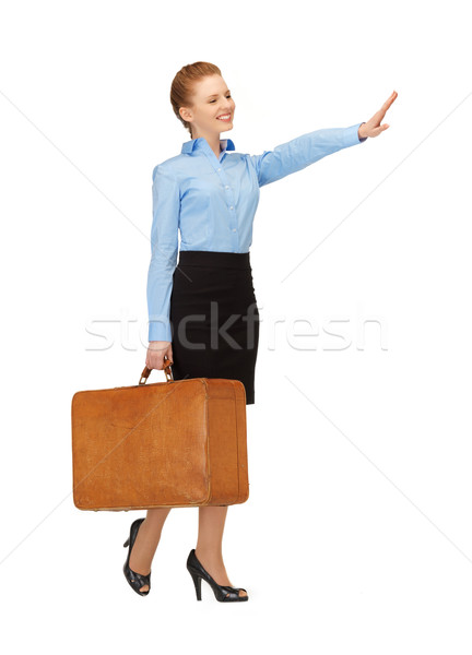 hitch-hiking woman with suitcase Stock photo © dolgachov