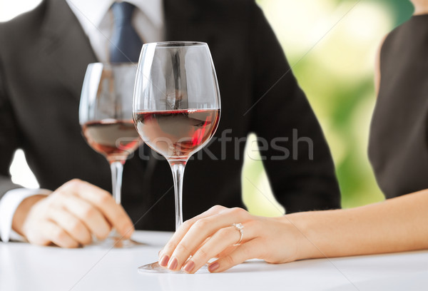 engaged couple with wine glasses Stock photo © dolgachov