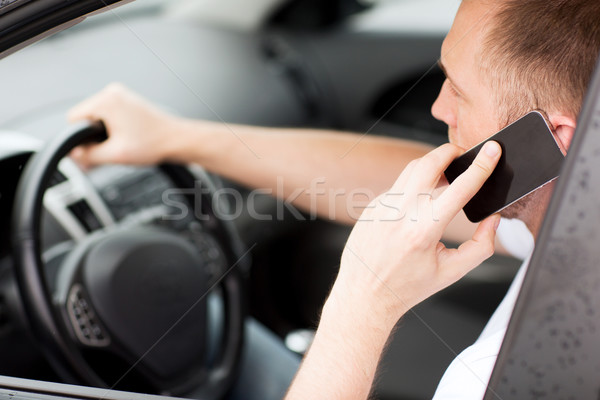 Férfi telefon vezetés autó közlekedés jármű Stock fotó © dolgachov