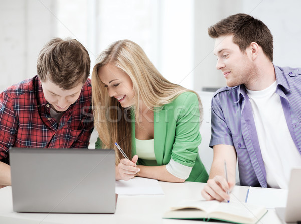 Studenten schriftlich etwas Schule Bildung Notebooks Stock foto © dolgachov