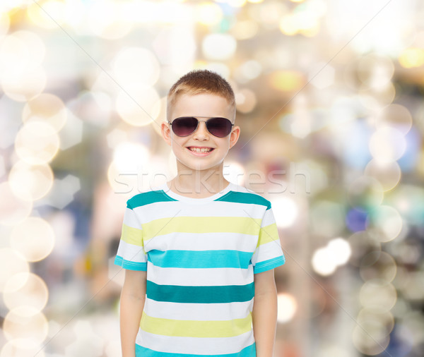 smiling cute little boy in sunglasses Stock photo © dolgachov
