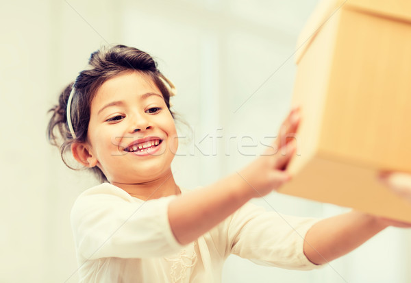 happy child girl with gift box Stock photo © dolgachov