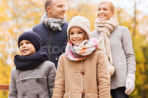 happy family in autumn park Stock photo © dolgachov