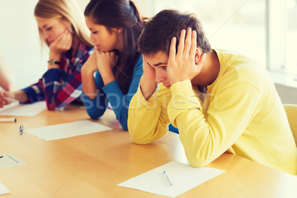 group of students with papers Stock photo © dolgachov