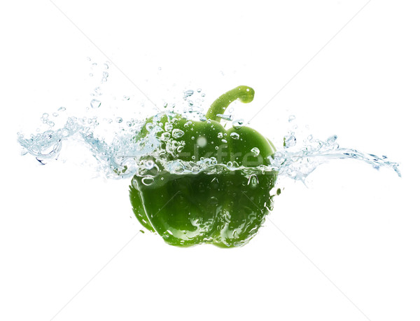 Stock photo: pepper falling or dipping in water with splash