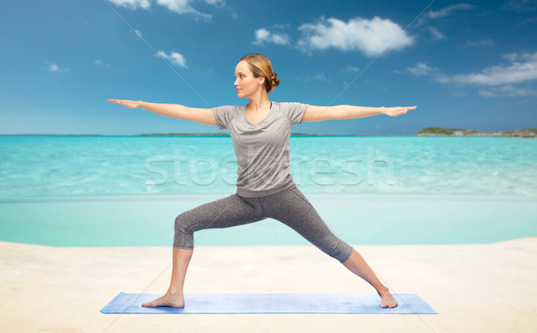 Nő készít jóga harcos póz fitnessz Stock fotó © dolgachov