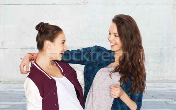 Stock photo: happy smiling pretty teenage girls hugging