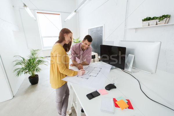 creative team with blueprint working at office Stock photo © dolgachov