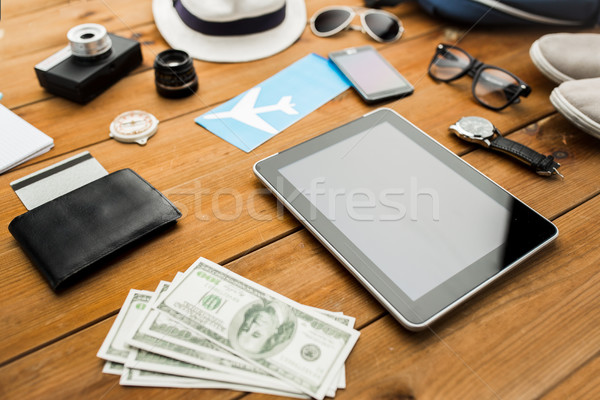 close up of gadgets and traveler personal stuff Stock photo © dolgachov