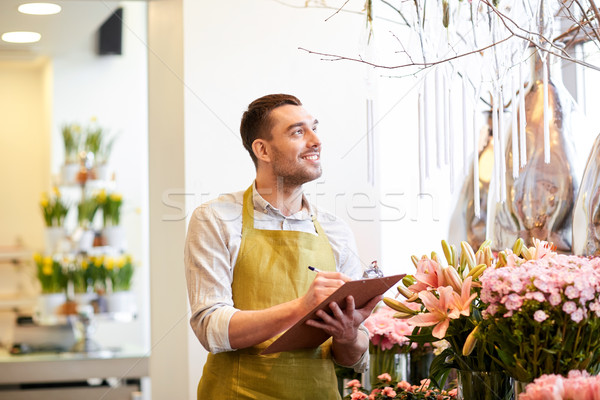 Blumengeschäft Mann Zwischenablage Blumenladen Menschen Verkauf Stock foto © dolgachov