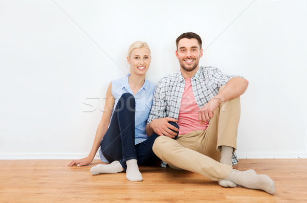 happy couple of man and woman to new home Stock photo © dolgachov