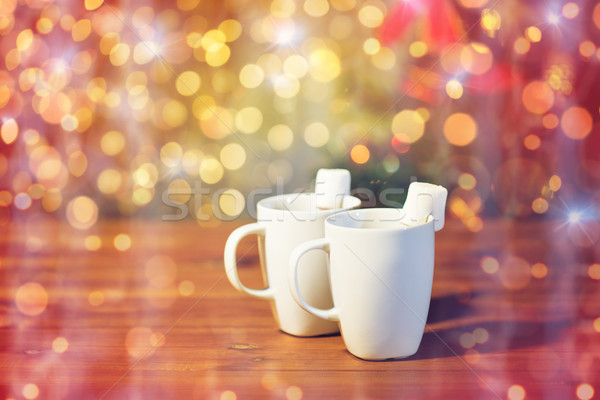 Csészék forró csokoládé mályvacukor fa karácsony ünnepek Stock fotó © dolgachov