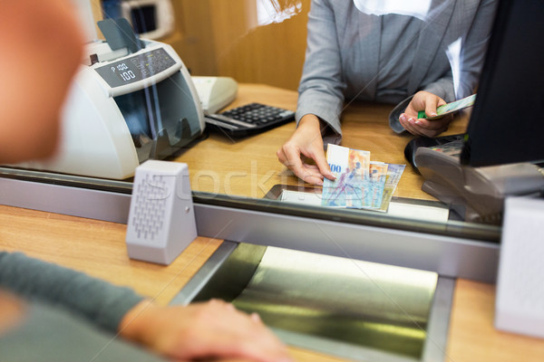 Stock photo: clerk counting cash money at bank office