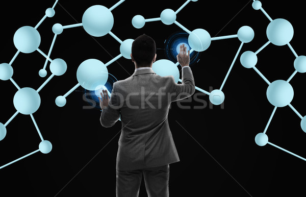 Stock photo: businessman working with molecule formula