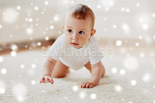 Little Baby In Diaper Crawling On Floor At Home Stock Photo C Syda