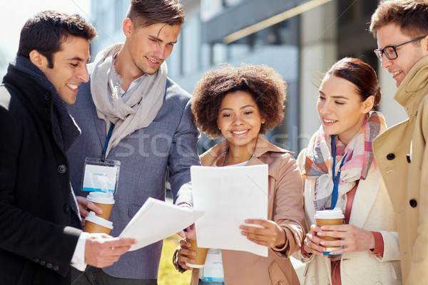 international business team with papers outdoors Stock photo © dolgachov