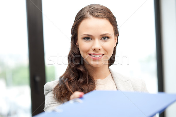 woman with folder Stock photo © dolgachov