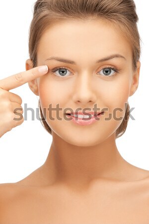 woman touching her face skin Stock photo © dolgachov