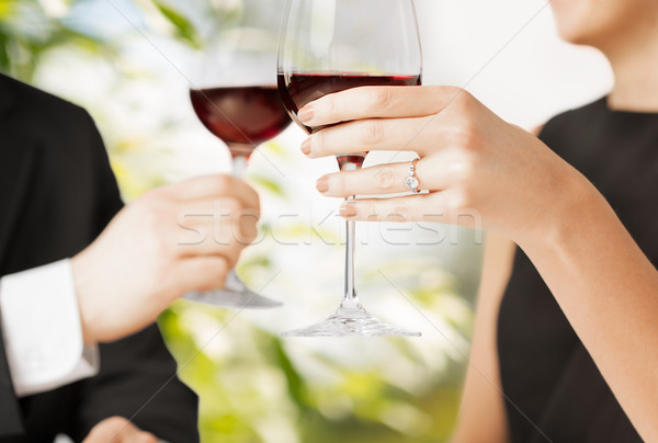engaged couple with wine glasses Stock photo © dolgachov