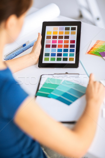 woman working with color samples for selection Stock photo © dolgachov