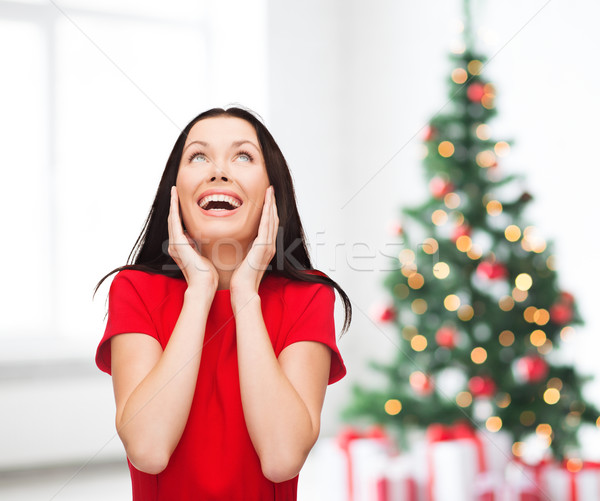 笑 年輕女子 紅色禮服 幸福 人 商業照片 © dolgachov