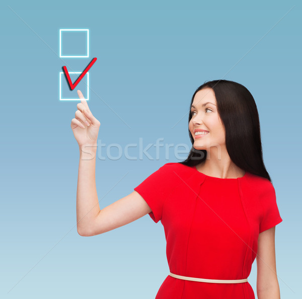 красное платье указывая пальца образование бизнеса Сток-фото © dolgachov